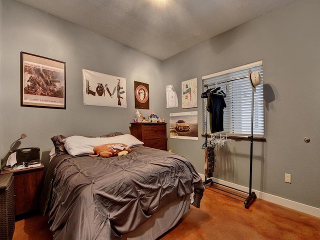 bedroom with a textured ceiling