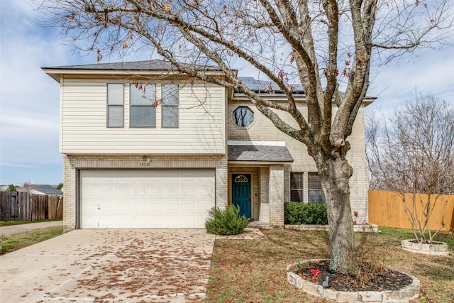 front of property featuring a garage