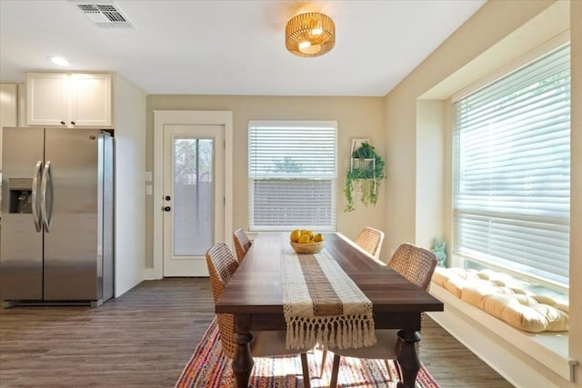 dining room featuring dark wood-type flooring