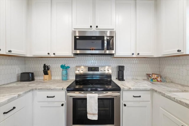 kitchen featuring white cabinetry and stainless steel appliances