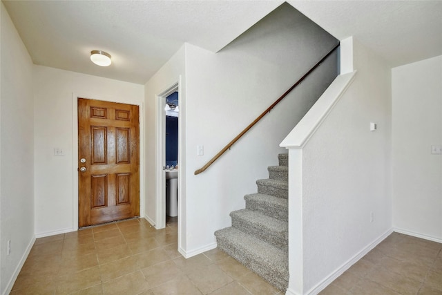 view of tiled entrance foyer