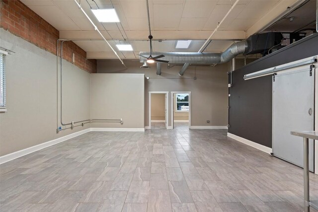 basement with ceiling fan