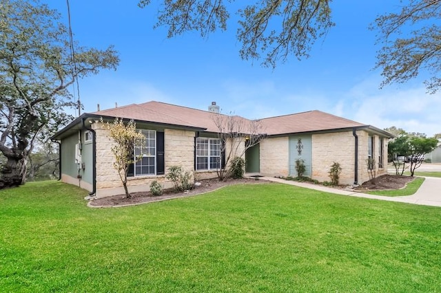 6333 La Mesa St, Leander, TX 78645 - ranch-style home with stone siding, a front yard, and a chimney