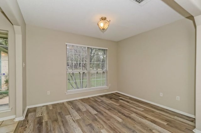 6333 La Mesa St, Leander, TX 78645 - spare room with wood finished floors and baseboards