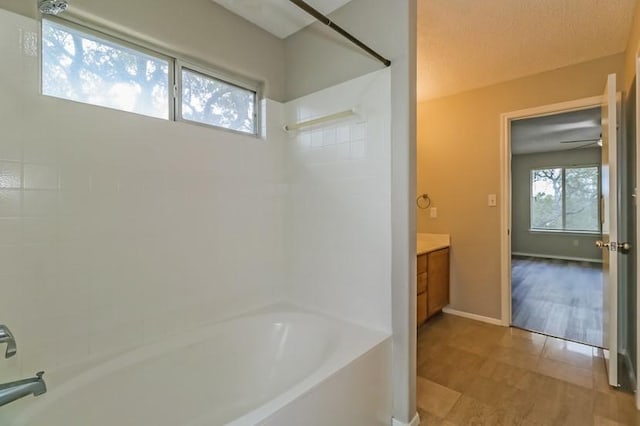 6333 La Mesa St, Leander, TX 78645 - bathroom featuring vanity, bathtub / shower combination, and tile patterned floors