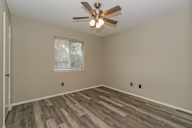 6333 La Mesa St, Leander, TX 78645 - empty room with dark wood-type flooring and a ceiling fan