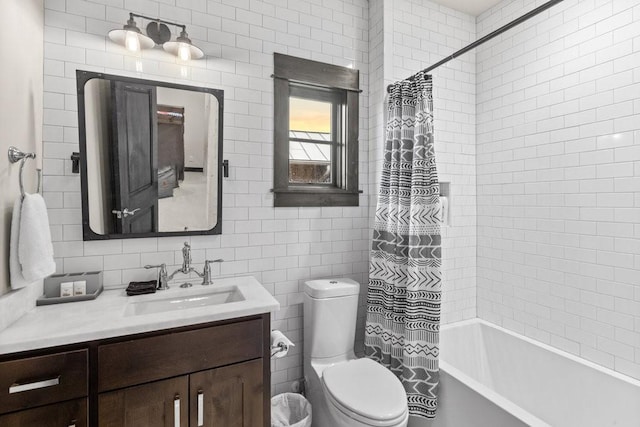 full bathroom with toilet, tile walls, vanity, shower / bath combo, and backsplash