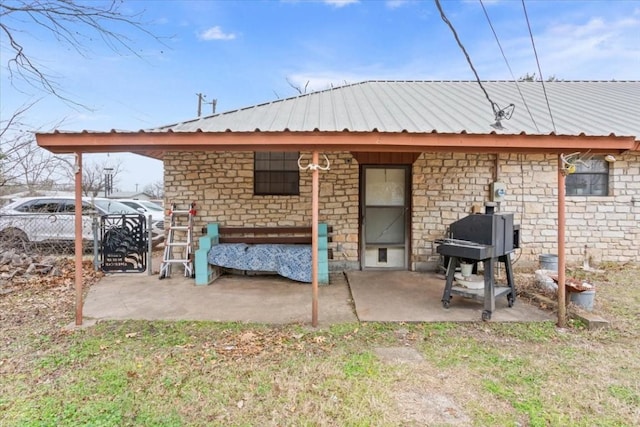 rear view of house with a patio