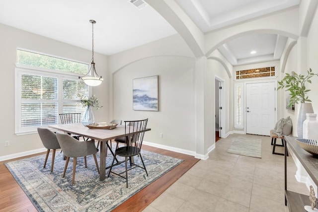 616 Basie Bnd, Cedar Park, TX 78613 - dining space with arched walkways and light wood-type flooring