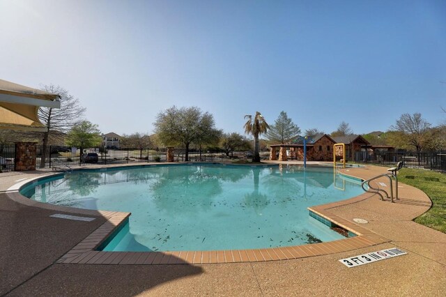 616 Basie Bnd, Cedar Park, TX 78613 - community pool with a patio area