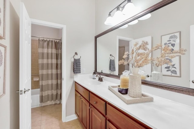 bathroom featuring shower / bath combination with curtain, tile patterned floors, and vanity