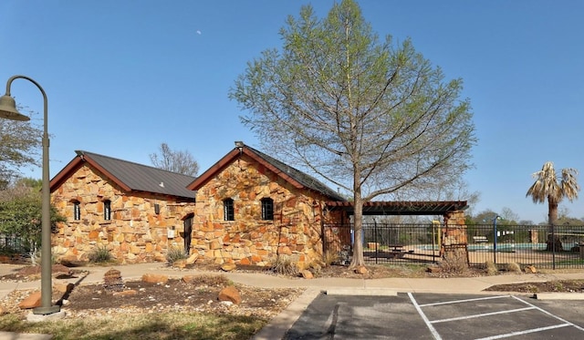 616 Basie Bnd, Cedar Park, TX 78613 - view of front of home with stone siding and uncovered parking