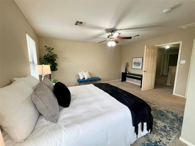 bedroom with ceiling fan and carpet flooring