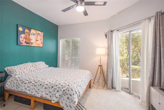 tiled bedroom with ceiling fan