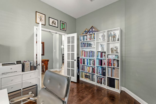 sitting room with dark hardwood / wood-style floors and french doors