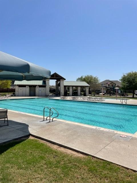 view of pool with a patio area