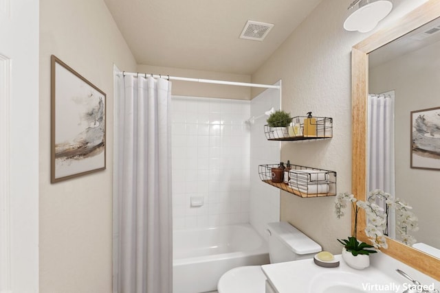 bathroom with toilet, visible vents, shower / bath combination with curtain, and vanity