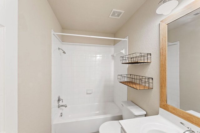 full bathroom with toilet, shower / tub combination, visible vents, and vanity