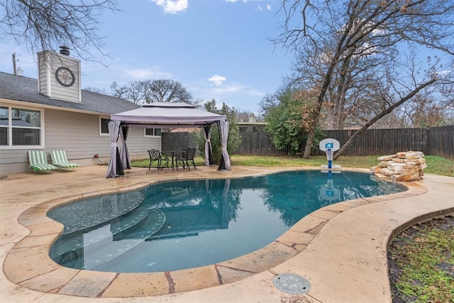 view of pool with a gazebo and a patio area