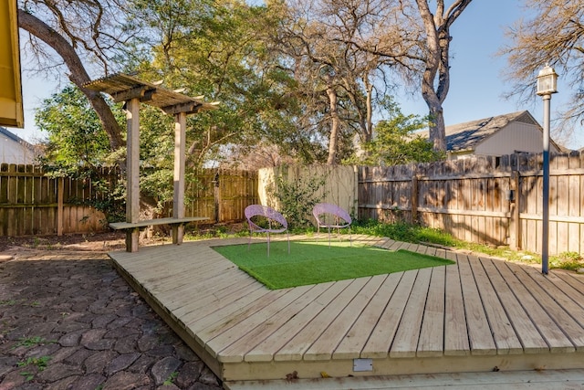 view of yard with a wooden deck