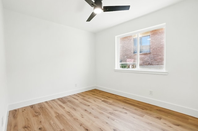 spare room with ceiling fan and light hardwood / wood-style flooring