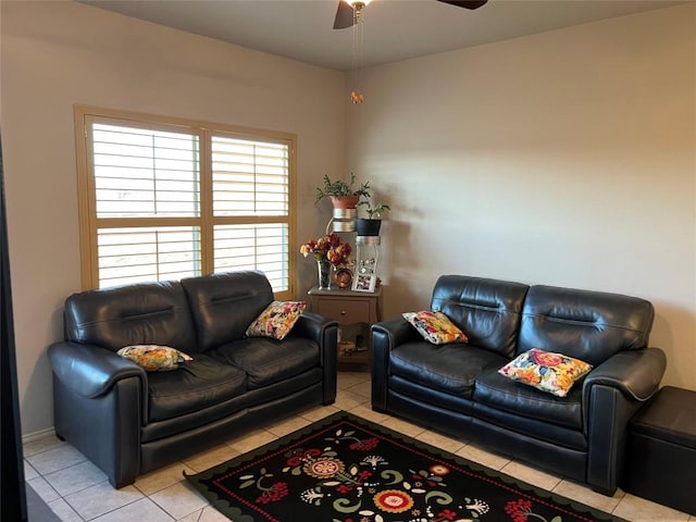 living room featuring light tile patterned floors and ceiling fan