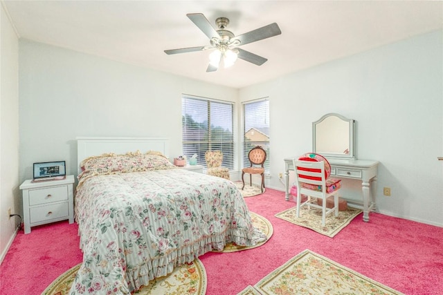 bedroom with light carpet and ceiling fan