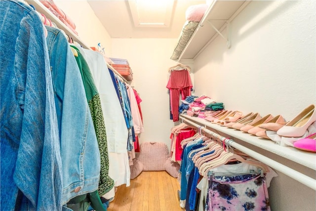 walk in closet featuring light wood-type flooring