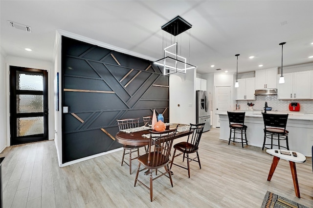 dining area featuring light hardwood / wood-style flooring