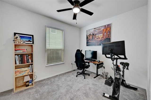 carpeted office with ceiling fan