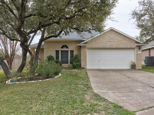 ranch-style home with a garage, cooling unit, and a front lawn