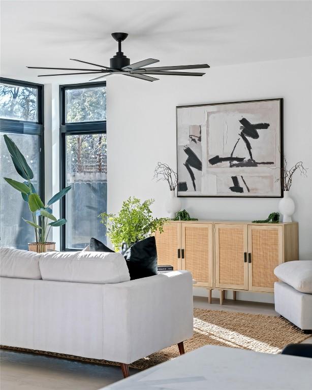 living room featuring ceiling fan