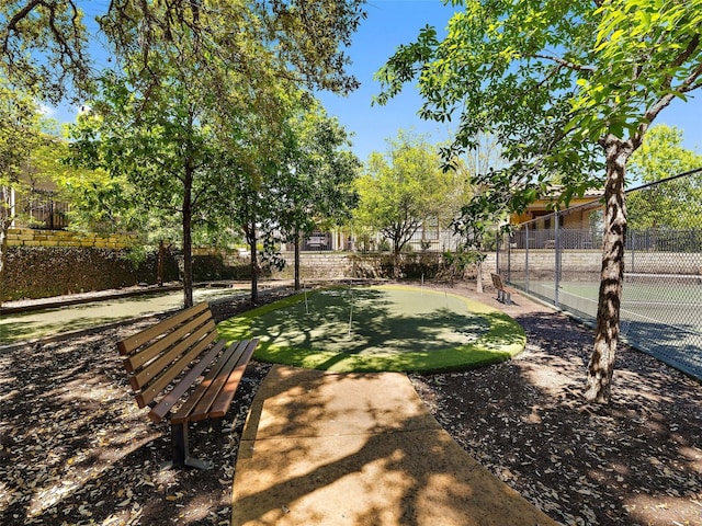 view of yard featuring tennis court