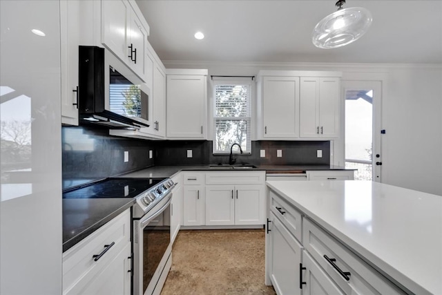 kitchen with white cabinetry, stainless steel electric range oven, backsplash, and decorative light fixtures