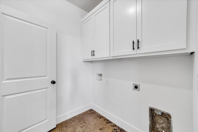 clothes washing area featuring cabinets, electric dryer hookup, and hookup for a washing machine