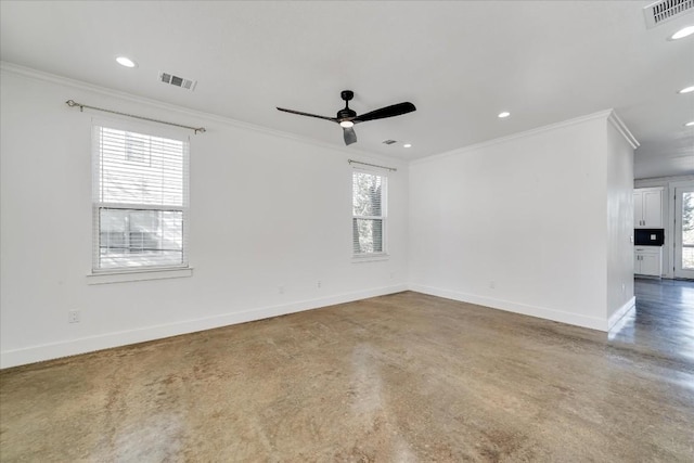 unfurnished room with ornamental molding, concrete floors, and ceiling fan