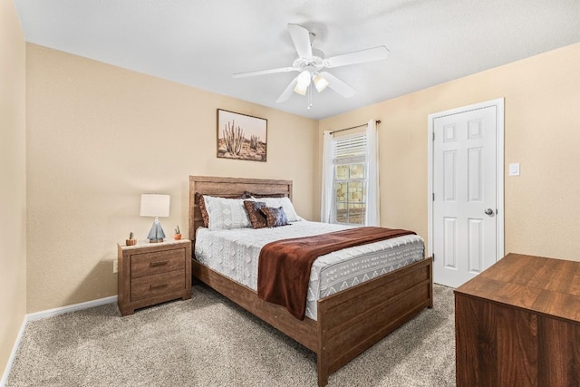 bedroom with light carpet and ceiling fan