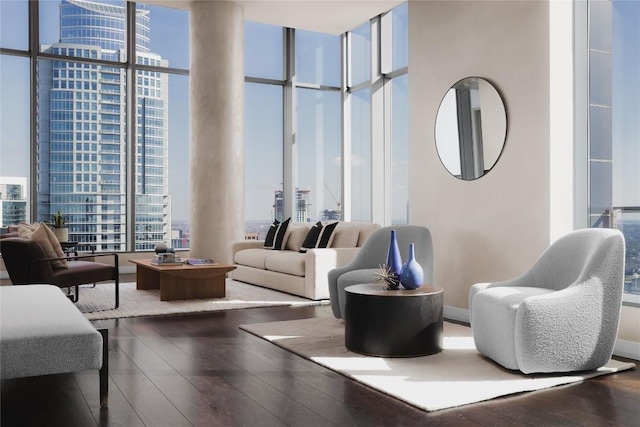 living room with hardwood / wood-style flooring and floor to ceiling windows