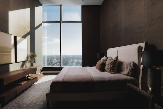 bedroom with a wall of windows