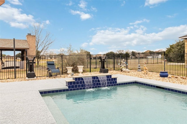 view of swimming pool featuring pool water feature