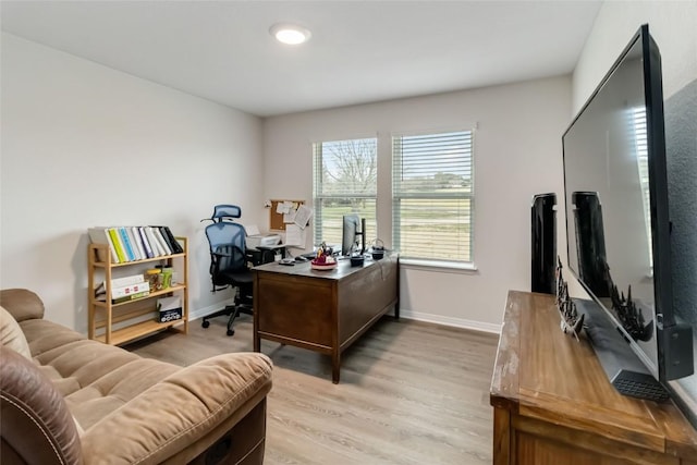 office area with light wood-type flooring