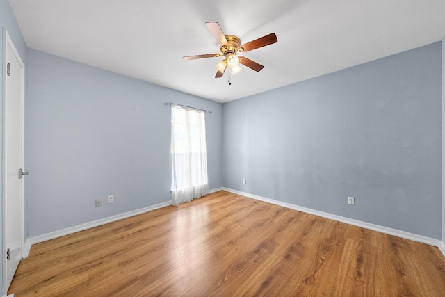 empty room with light hardwood / wood-style floors and ceiling fan