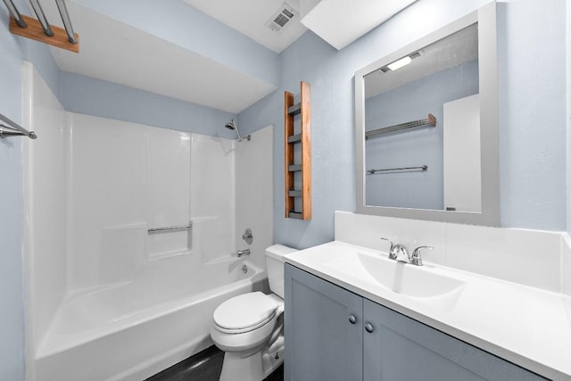 full bathroom featuring vanity,  shower combination, and toilet