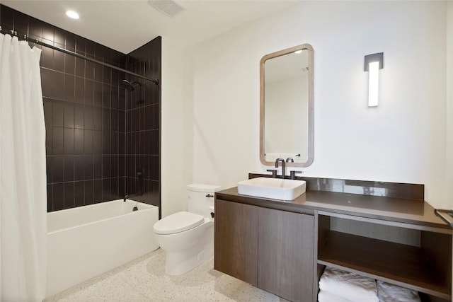 full bathroom featuring vanity, toilet, and shower / bath combo