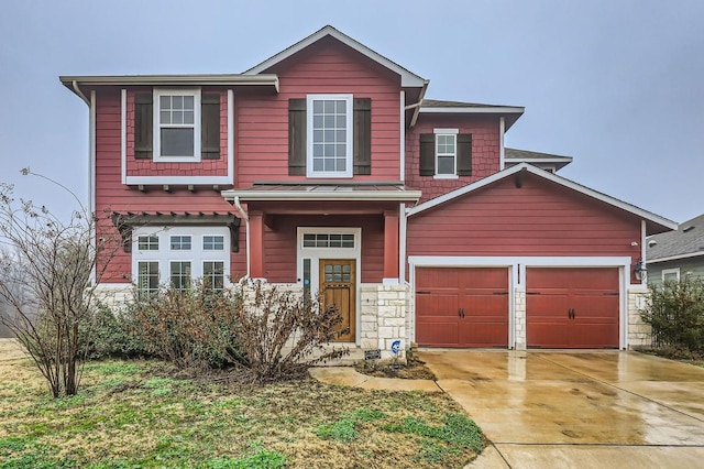 view of front of property with a garage