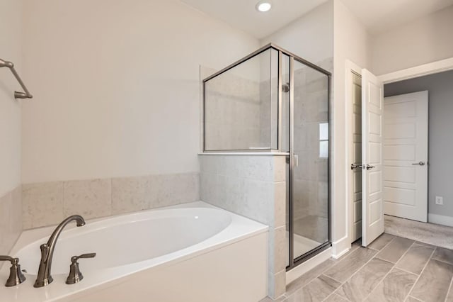 bathroom featuring plus walk in shower