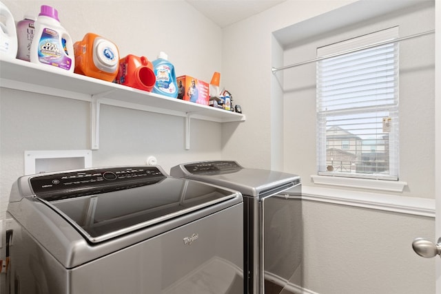 washroom featuring independent washer and dryer