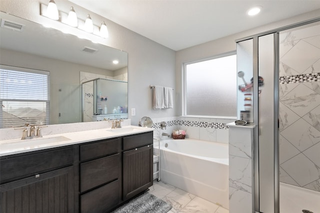 bathroom with independent shower and bath and vanity