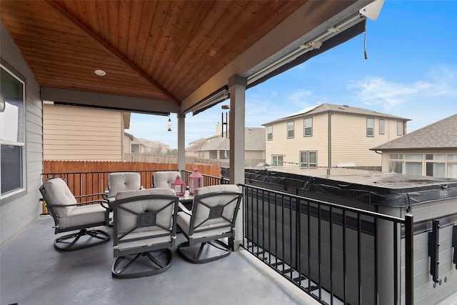 balcony with a hot tub