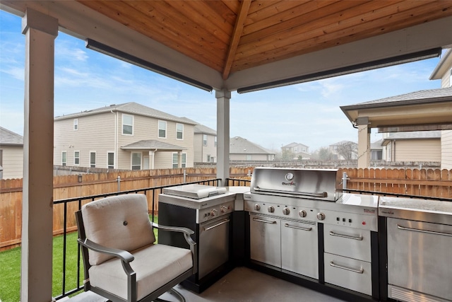 view of patio featuring a grill and exterior kitchen